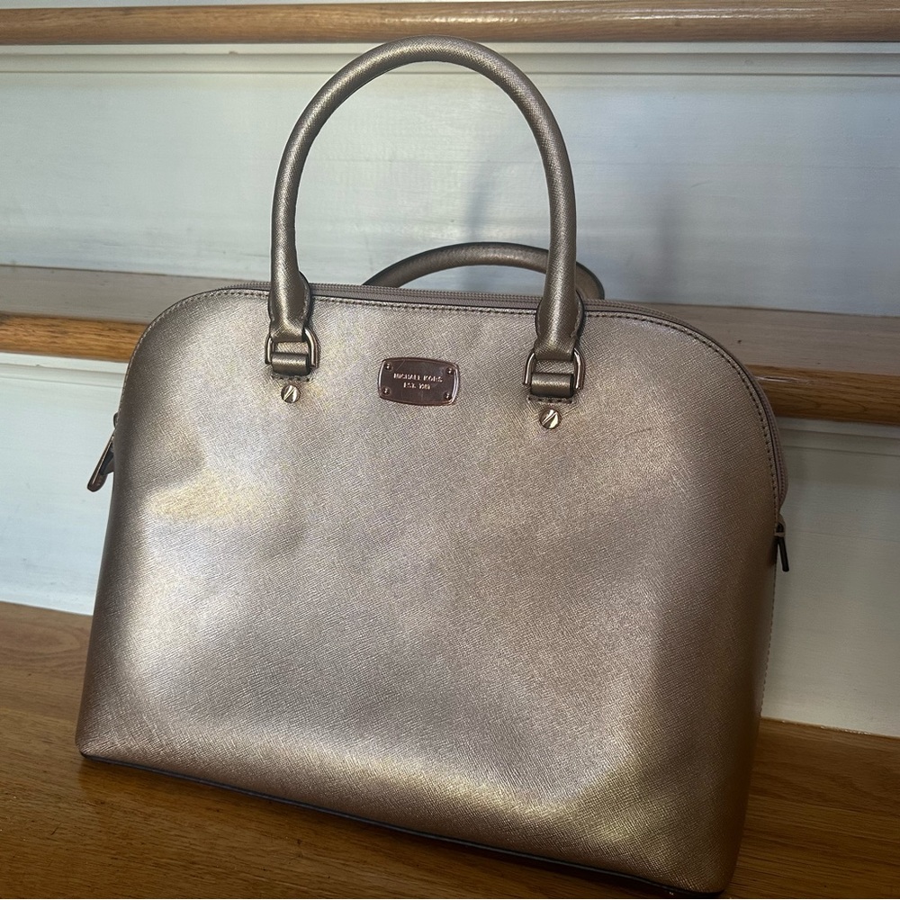 New without tags. Michael Kors gold satchel. I also have the strap